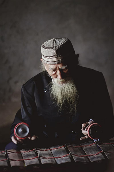 Photograph M Eko Burhanul M Old Man Playing Gamelan on One Eyeland
